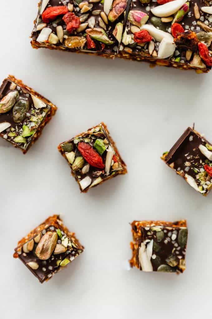 superfood energy bites topped with goji berries and pistachios