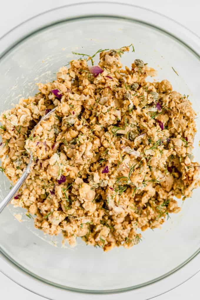 smashed chickpea salad in a mixing bowl