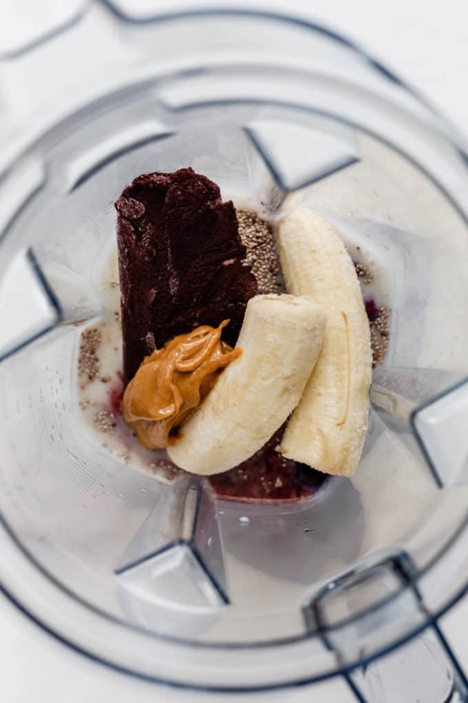 bananas, peanut butter, acai and chia seeds in a blender