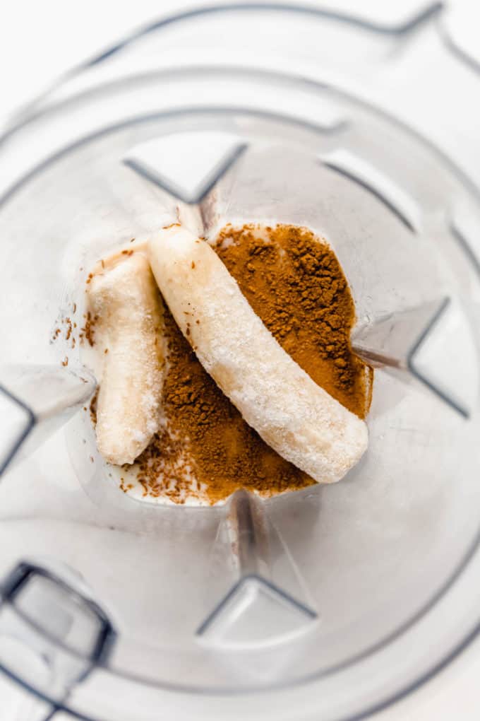 bananas, almond milk and cinnamon in a blender