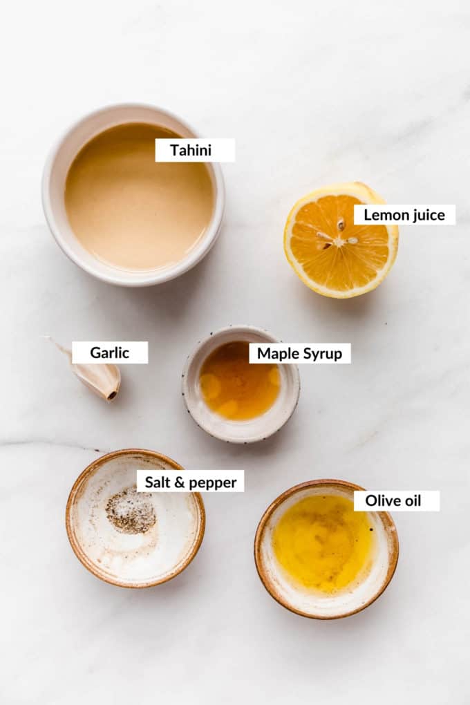 a flat lay of ingredients for lemon tahini dressing