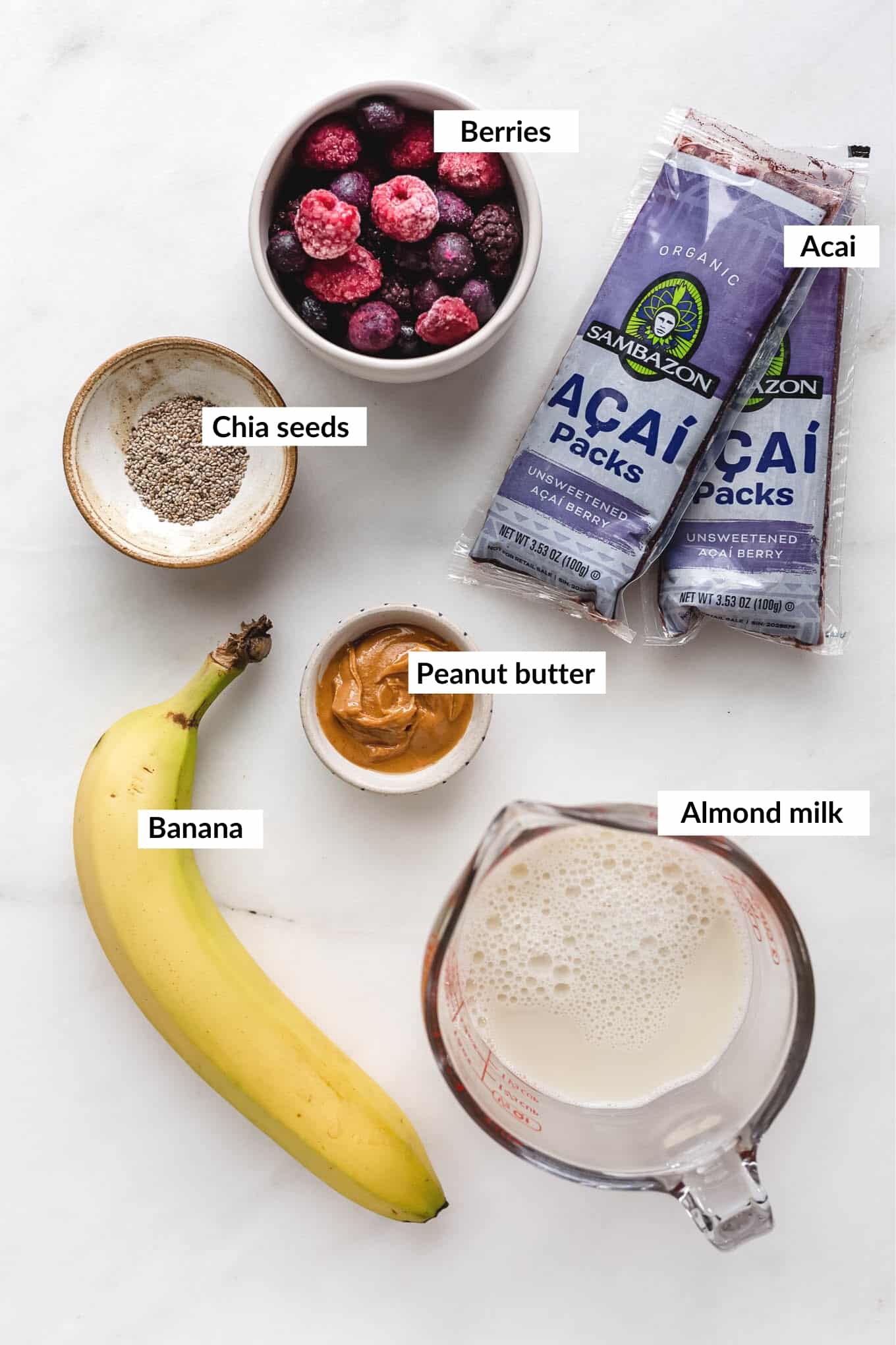 A flat lay of ingredients for an acai smoothie