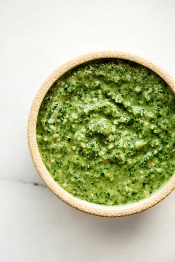 A close up of a bowl of a walnut pesto