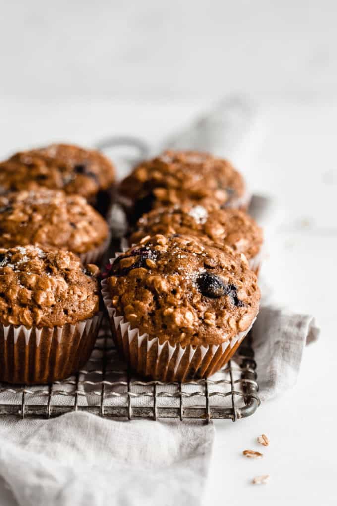 Blueberry muffins on a grey napkin