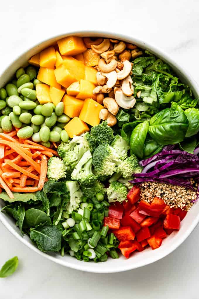 Ingredients for a Thai Crunch Salad in a white bowl