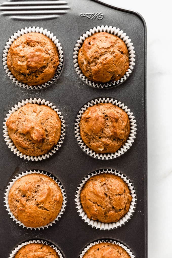 Banana nut muffins in a muffin pan