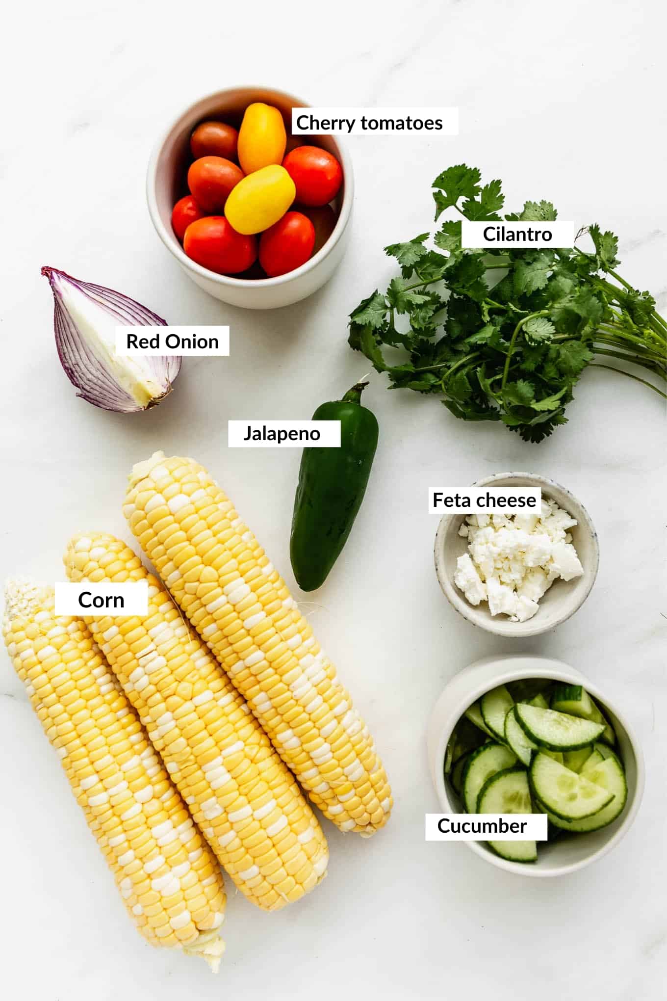 A flat lay of ingredients for corn salad