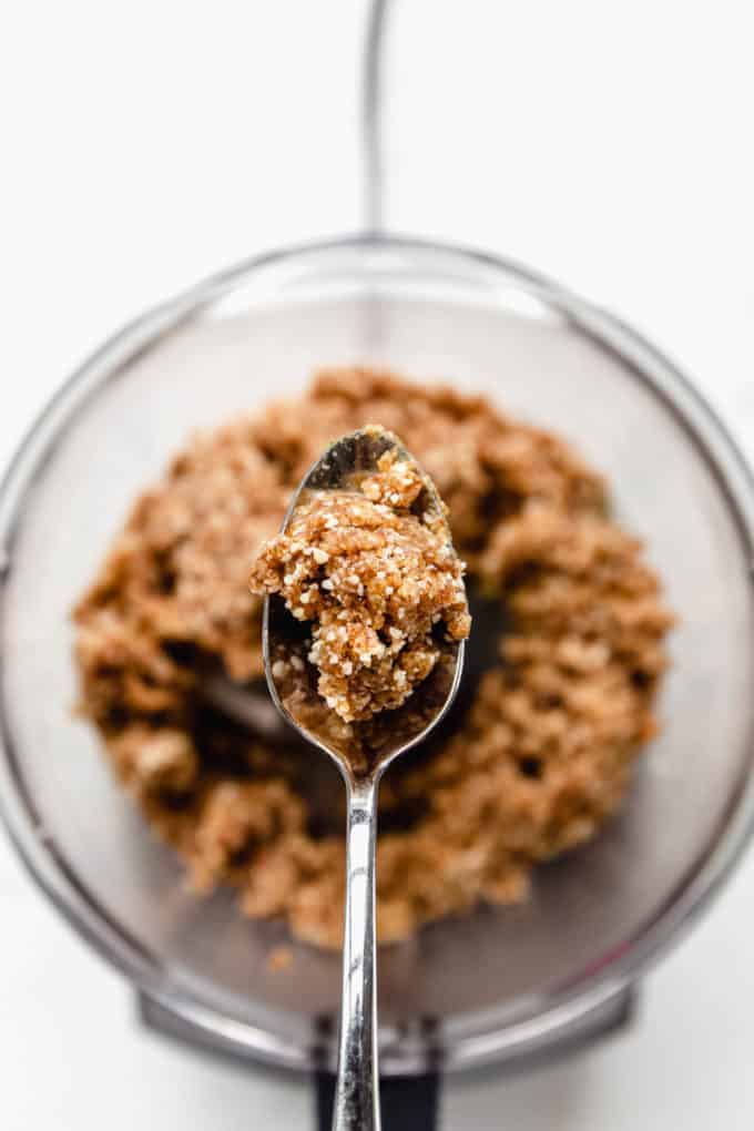 a spoon with key lime energy ball mixture on it