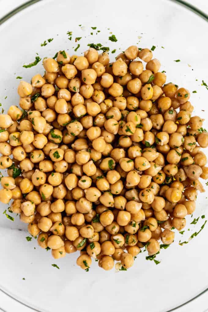 A close up of chickpeas in a mixing bowl