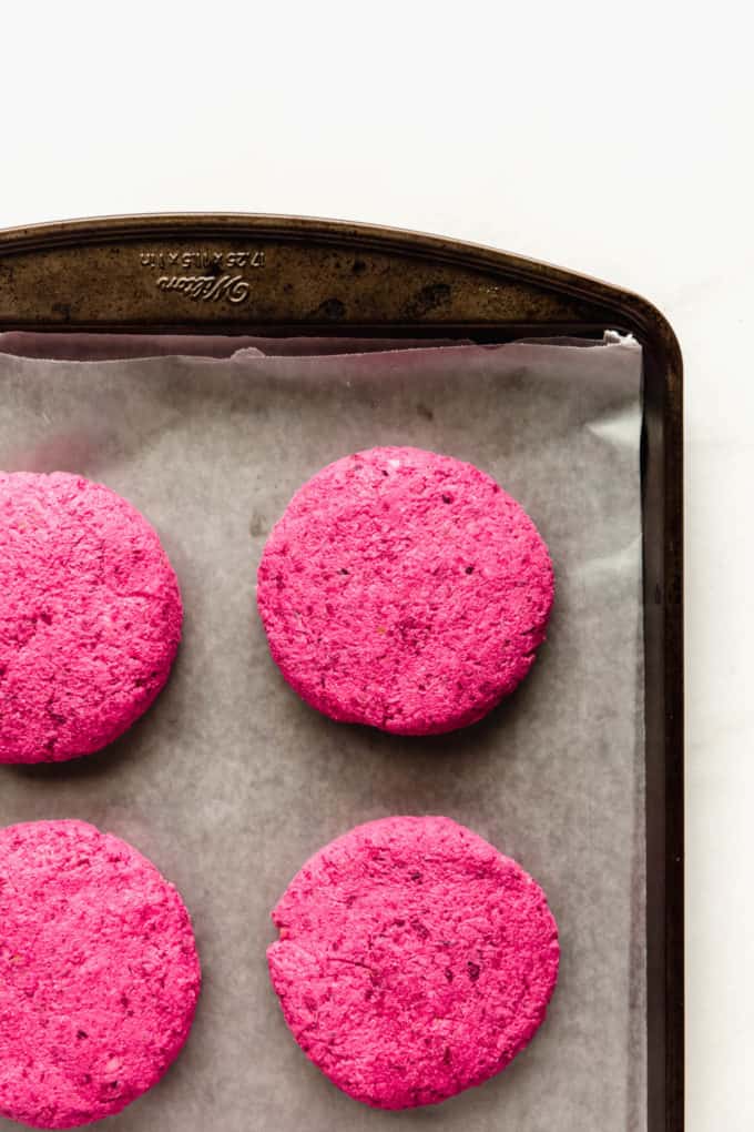 beet burgers on a baking sheet