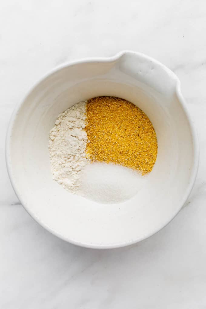 flour, cornmeal and sugar in a bowl