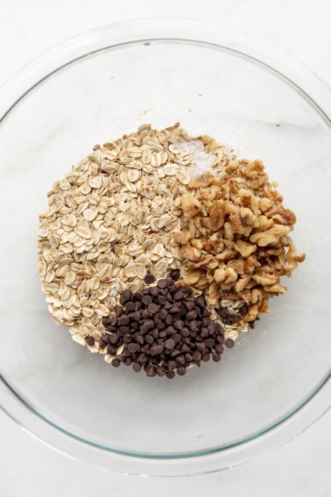 oats, walnuts, chocolate chips and salt in a mixing bowl