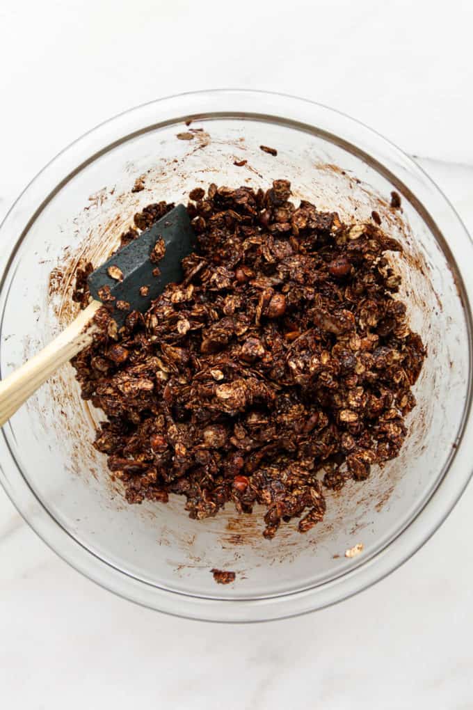 unbaked chocolate granola in a mixing bowl