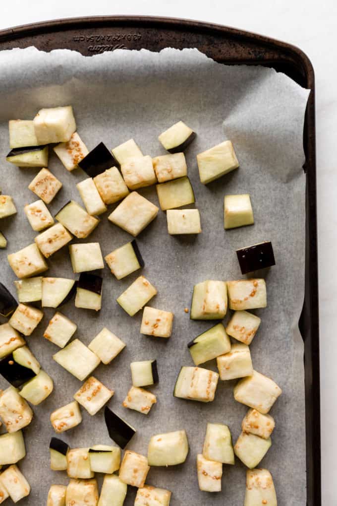 Cubed eggplant on a baking sheet