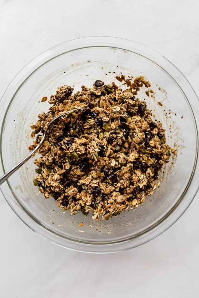 a clear mixing bowl with healthy breakfast cookie batter in it