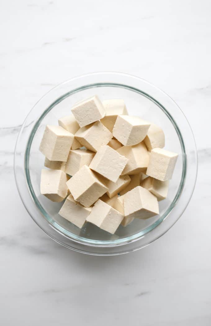 cubed tofu in a clear bowl