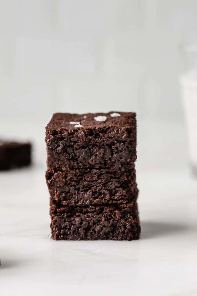 a stack of three vegan brownies