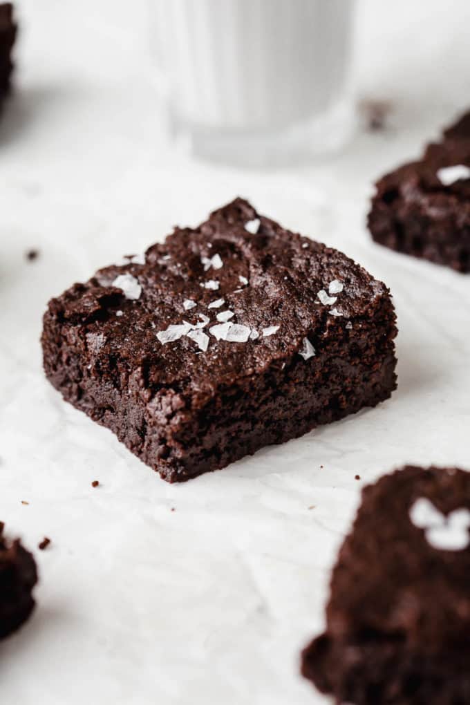A vegan brownie on parchment paper