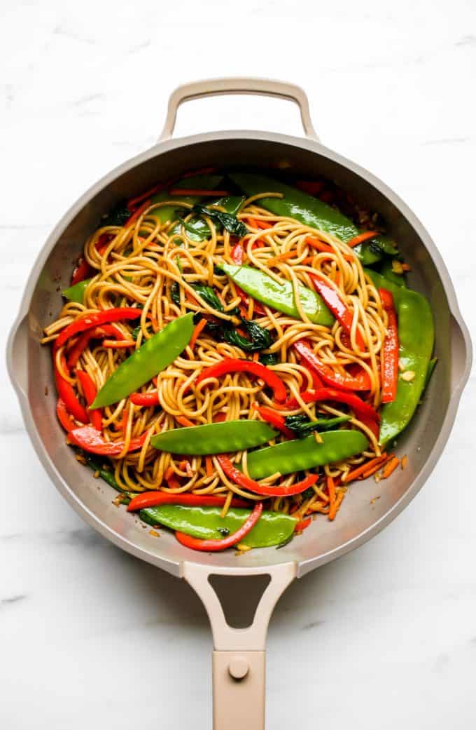A pan with vegetable lo mein in it