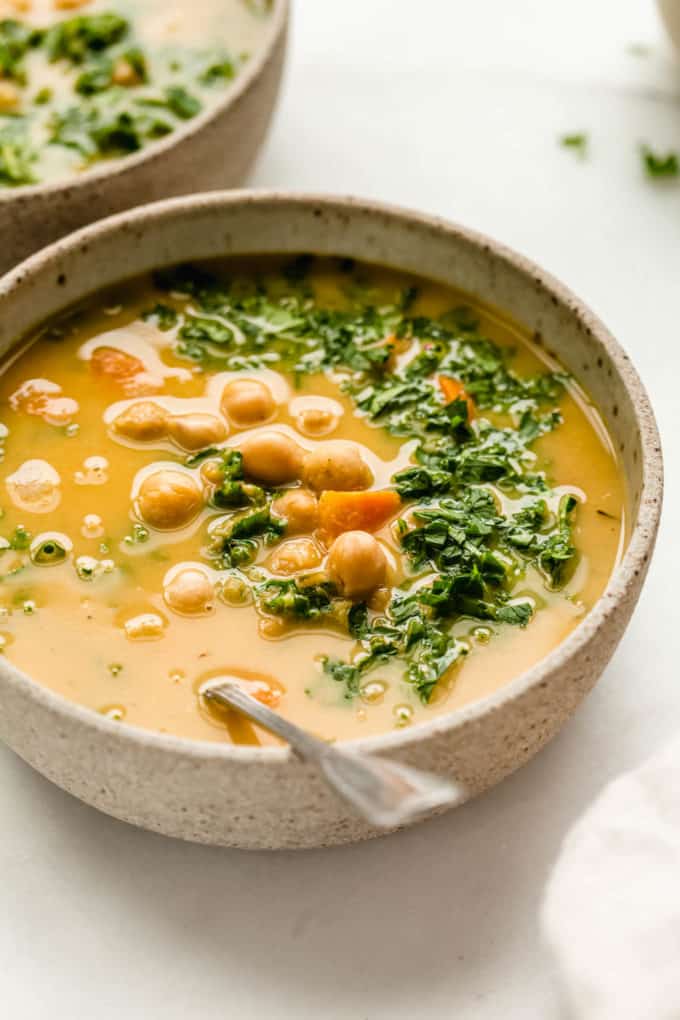 Chickpea soup in a beige ceramic bowl
