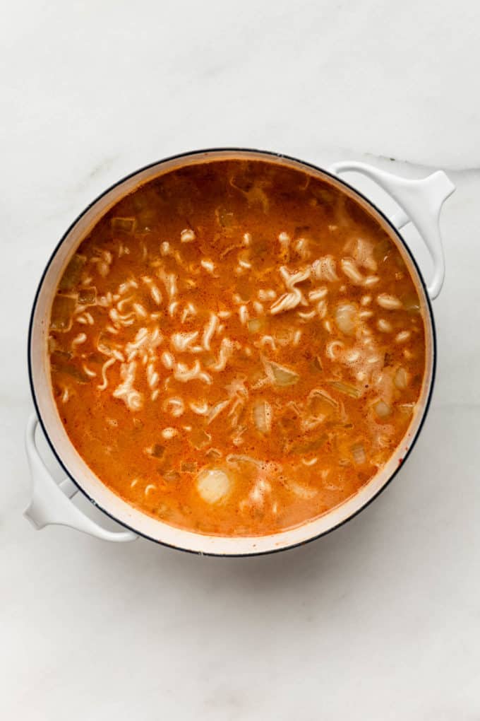 A pot of coconut curry ramen