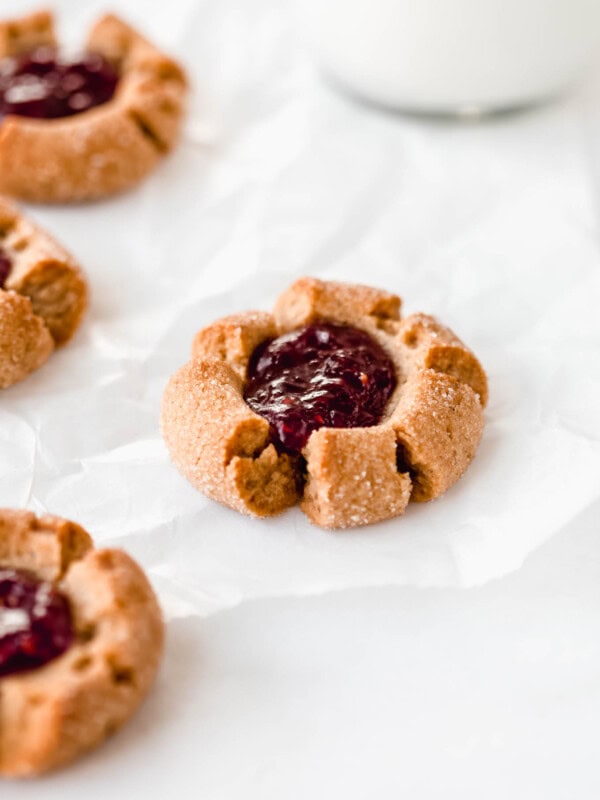 a peanut butter thumbprint cookie filled with jam