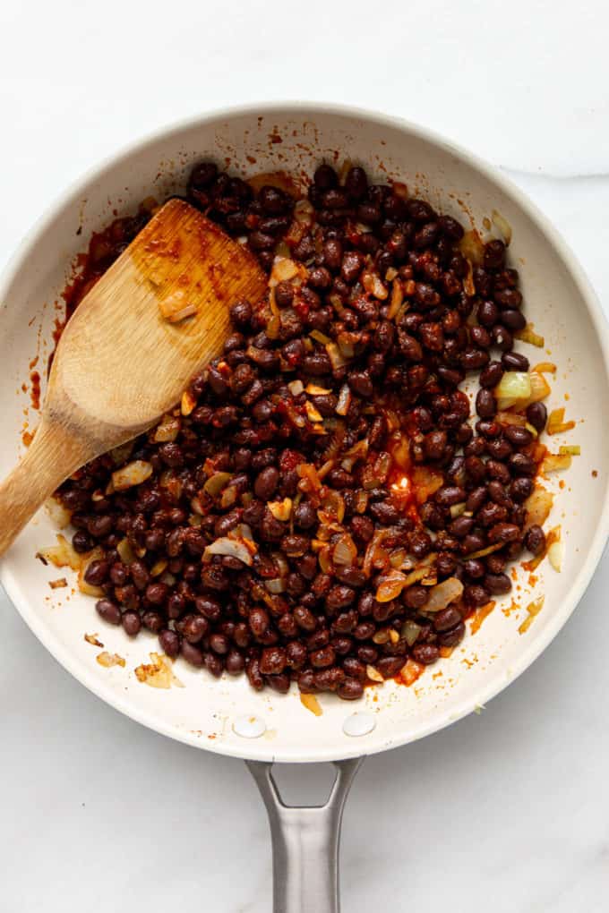 black beans in a white pan