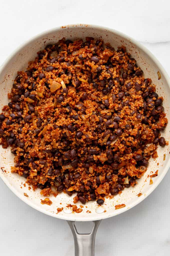 chipotle quinoa and black beans in a white pan