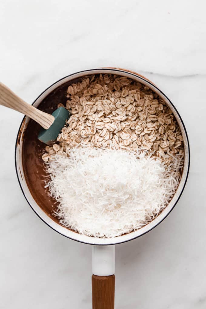 chocolate, oats and shredded coconut in a white pot