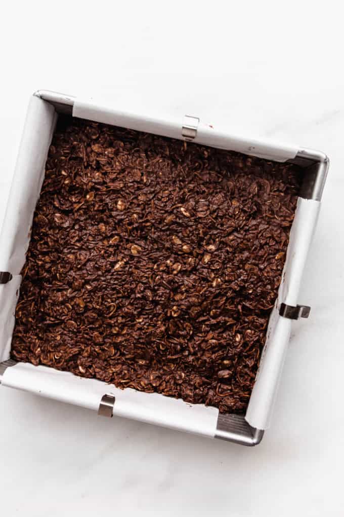 chocolate coconut bars in an 8x8 inch pan