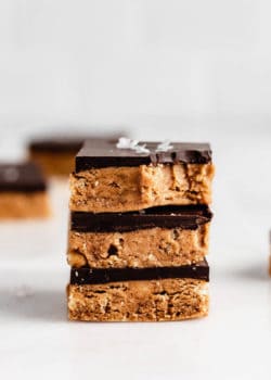 a stack of three peanut butter protein bars
