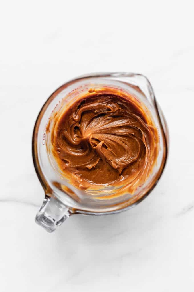peanut butter in a measuring cup