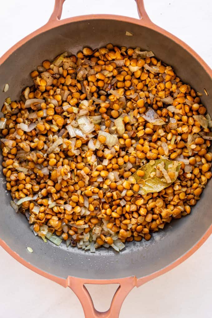 lentils and onions in a pan