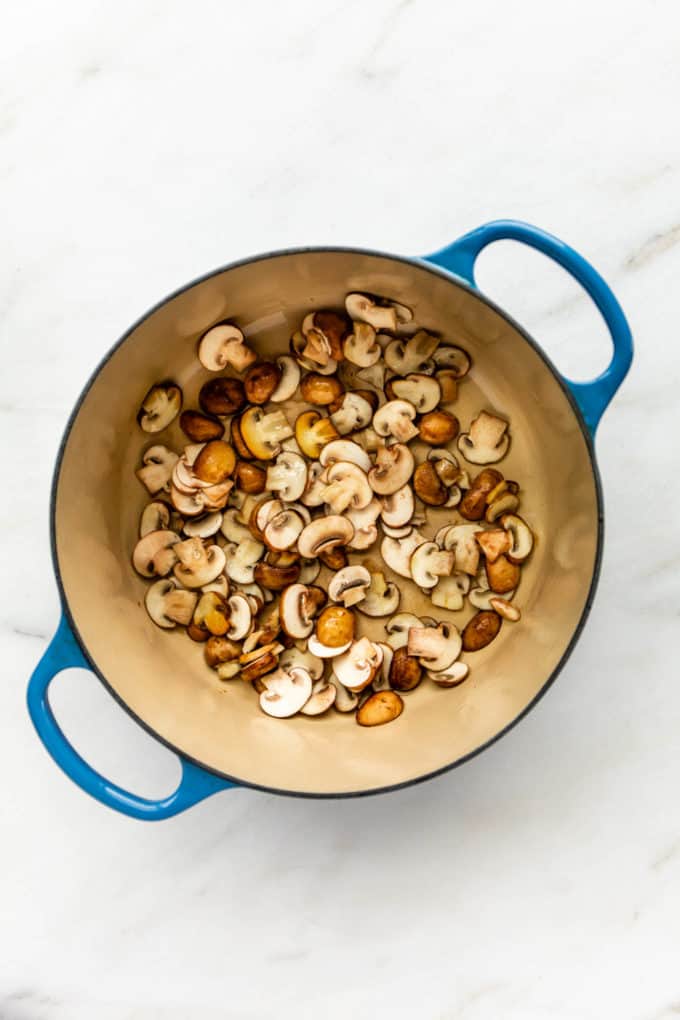 uncooked mushrooms in a pot