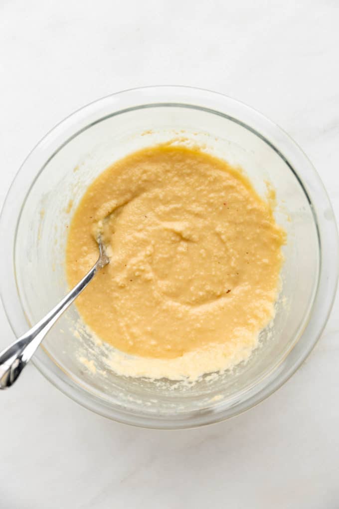 Almond flour waffle batter in a clear mixing bowl