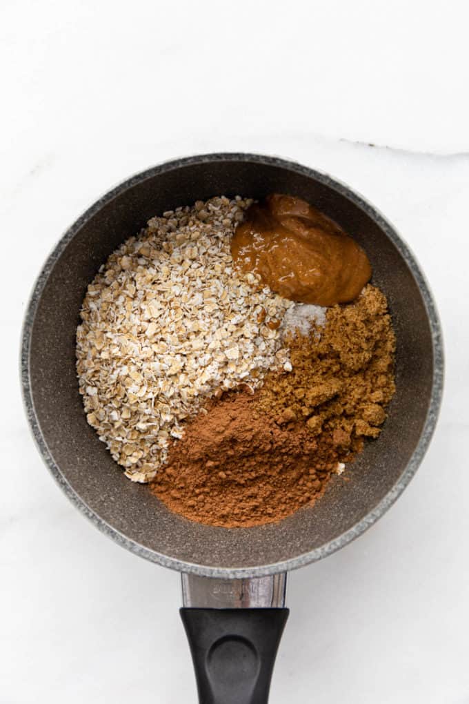 oats, almond butter, coconut sugar and cocoa powder in a pot