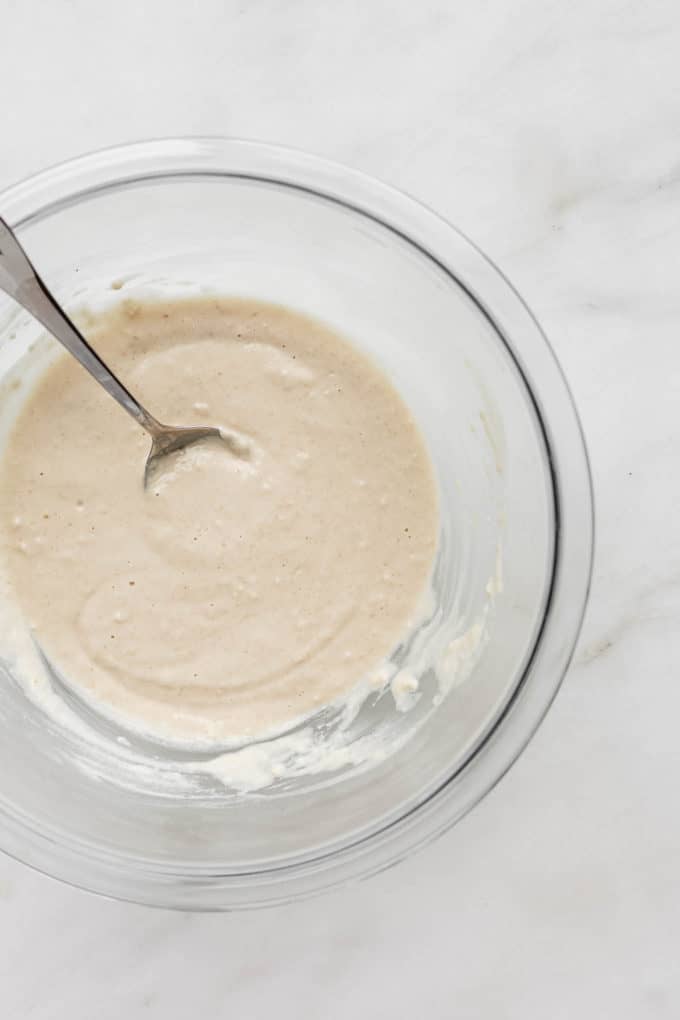 a bowl of batter to coat cauliflower