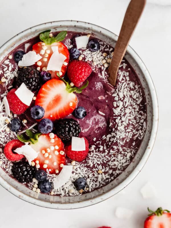 An acai bowl topped with berries