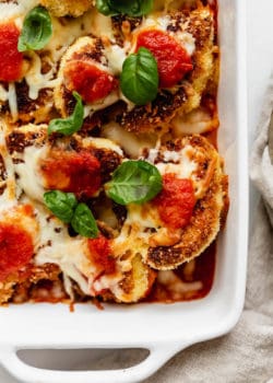Cauliflower Parmesan topped with fresh basil