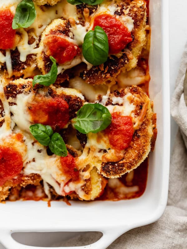 Cauliflower Parmesan topped with fresh basil