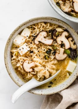 Miso ramen in a white speckled bowl
