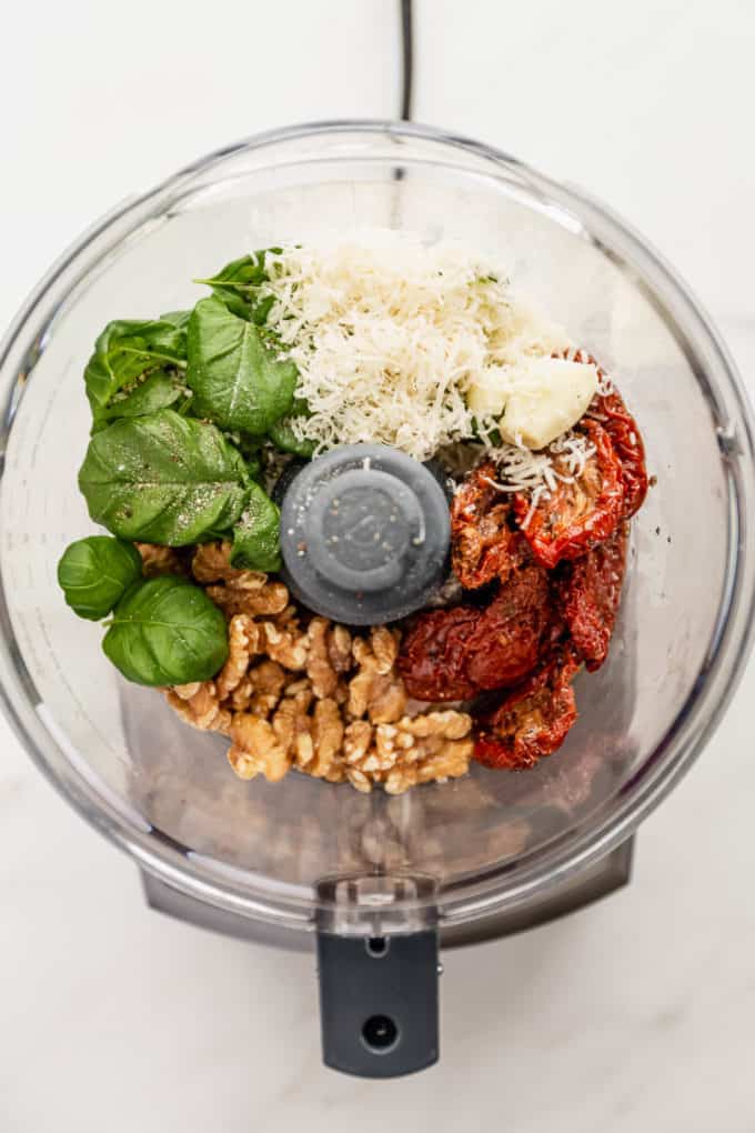 sun dried tomatoes, parmesan cheese, walnuts and basil in a food processor