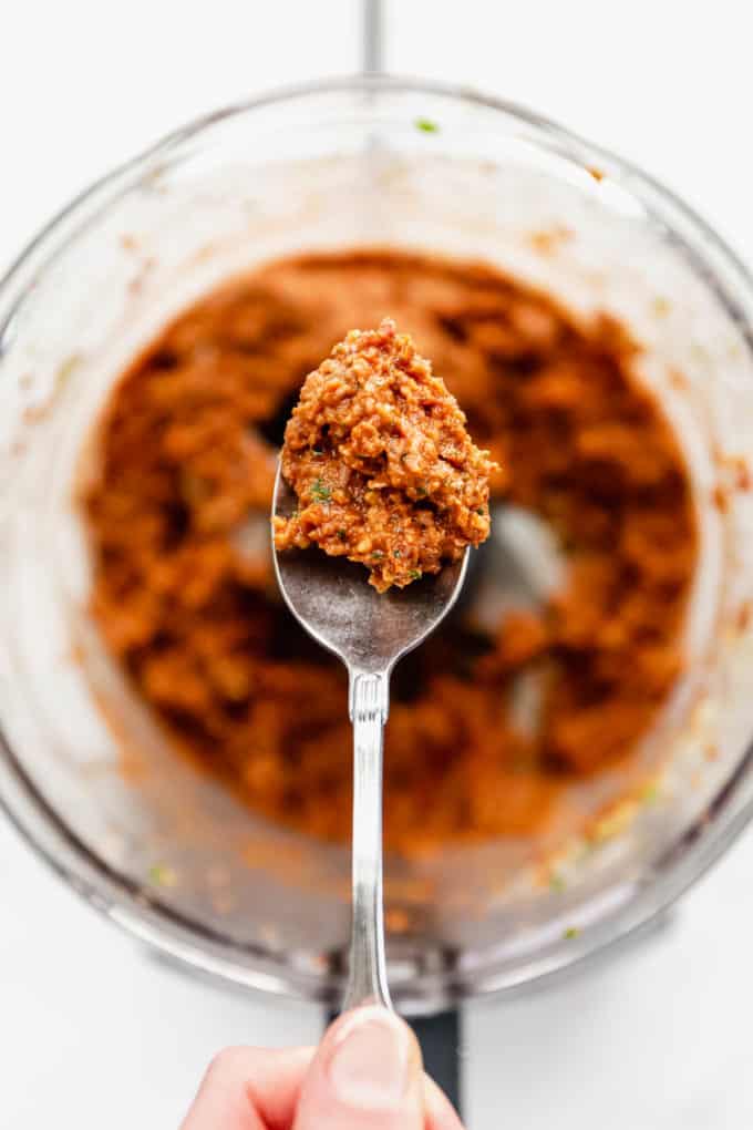 sun dried tomato pesto on a spoon