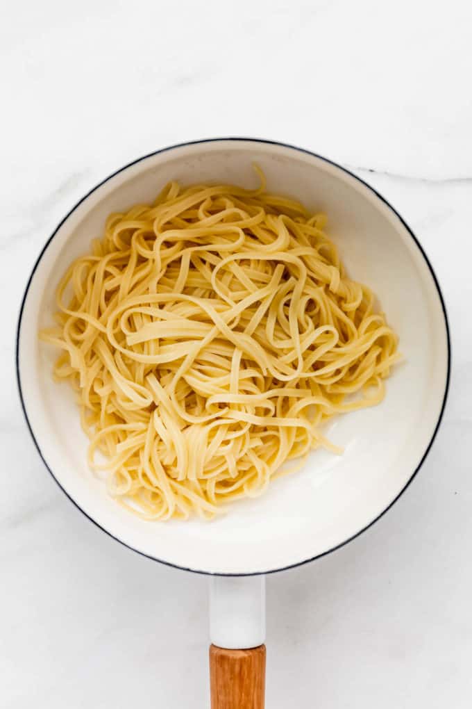 fettuccine in a white pot