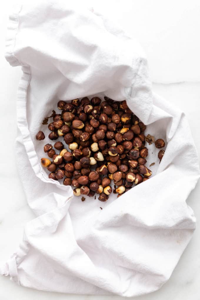 Hazelnuts in a white dish towel