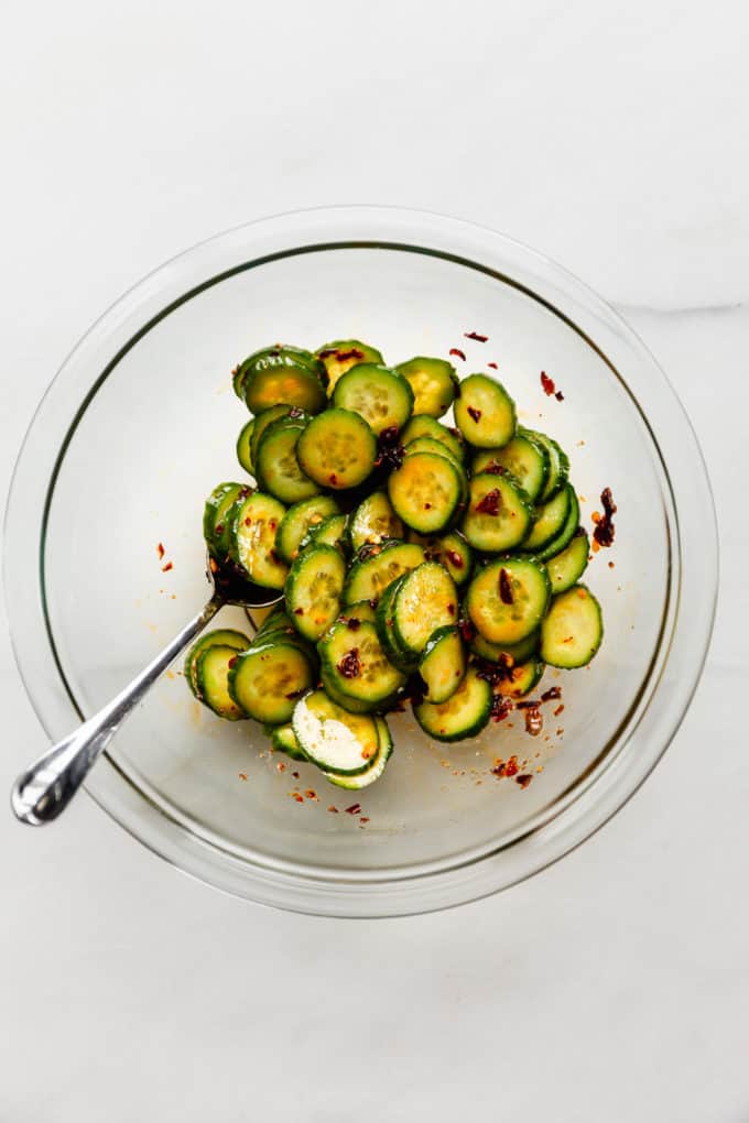 Asian cucumber salad in a mixing bowl
