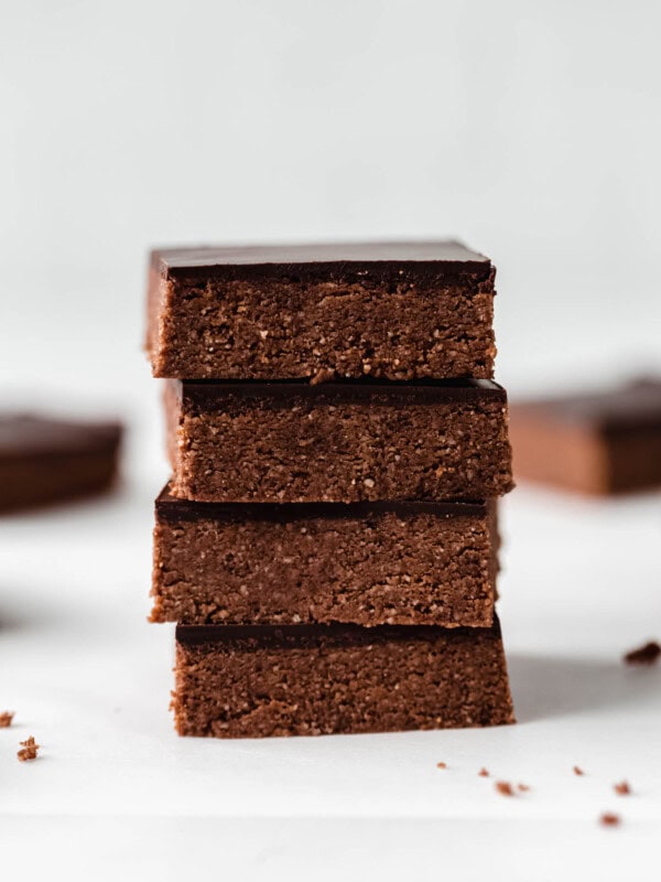 four chocolate protein bars stacked