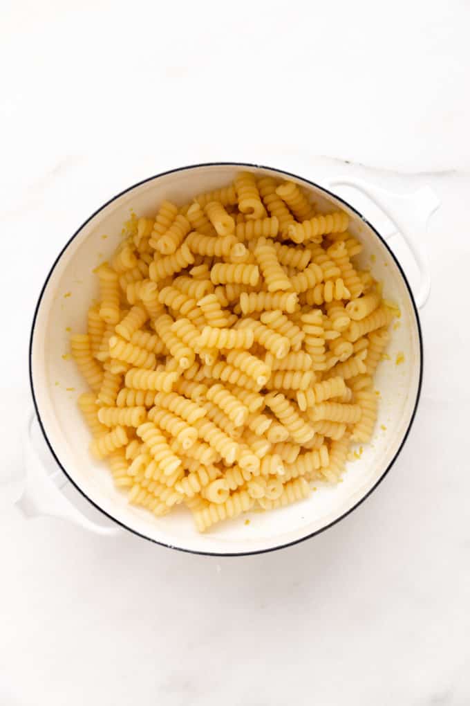 fusilli noodles in a white pot