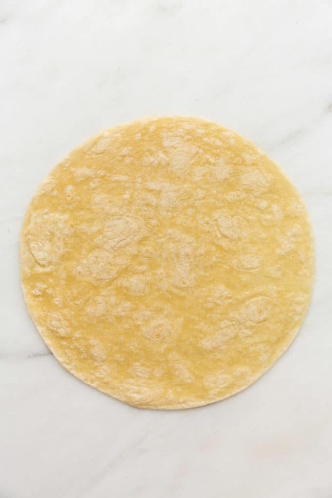a tortilla on a marble board