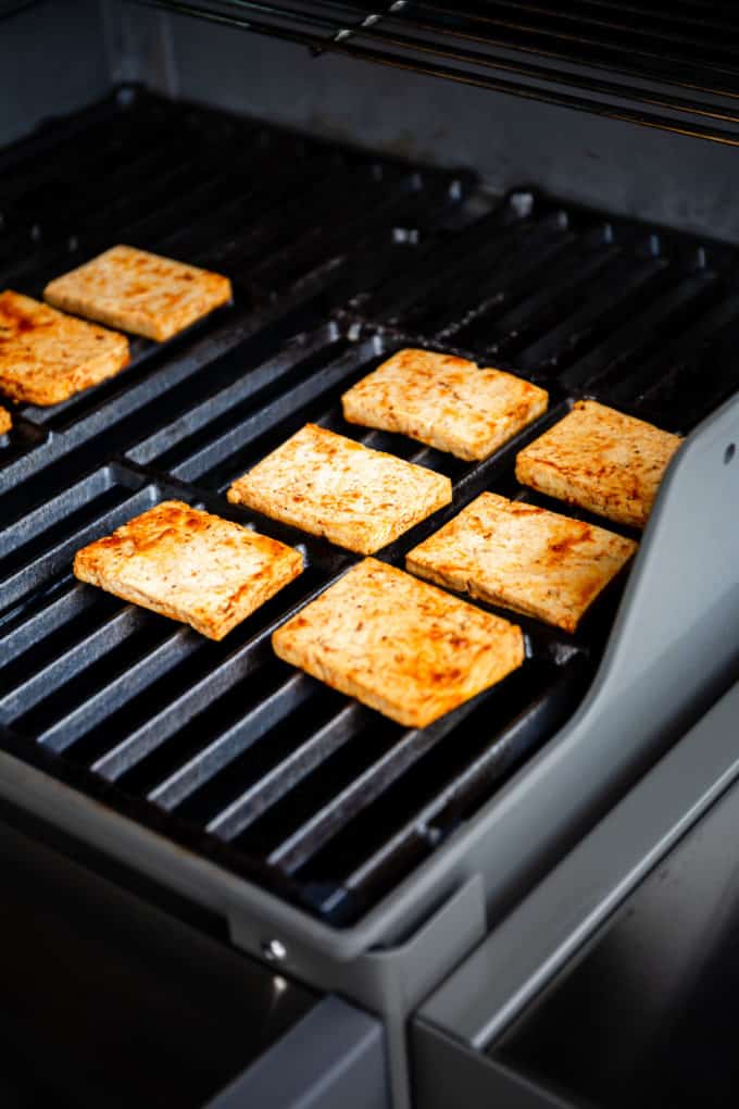marinated tofu on a grill